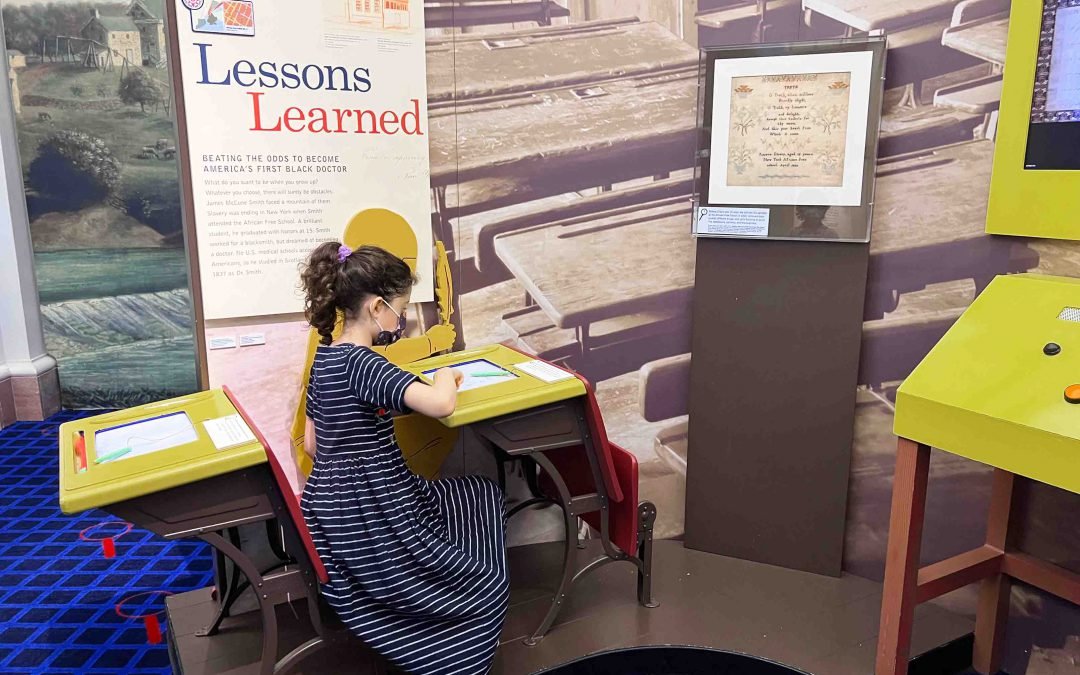 New York Historical Society DiMenna Children's Museum - Mimi at an old school desk